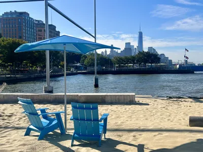 Though beachgoers are not allowed to go swimming, they can lounge in beach chairs and sit under the shade of umbrellas.&nbsp;