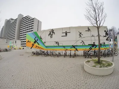 A mural in Munich's former Olympic Village features Otl Aicher's pictograms.