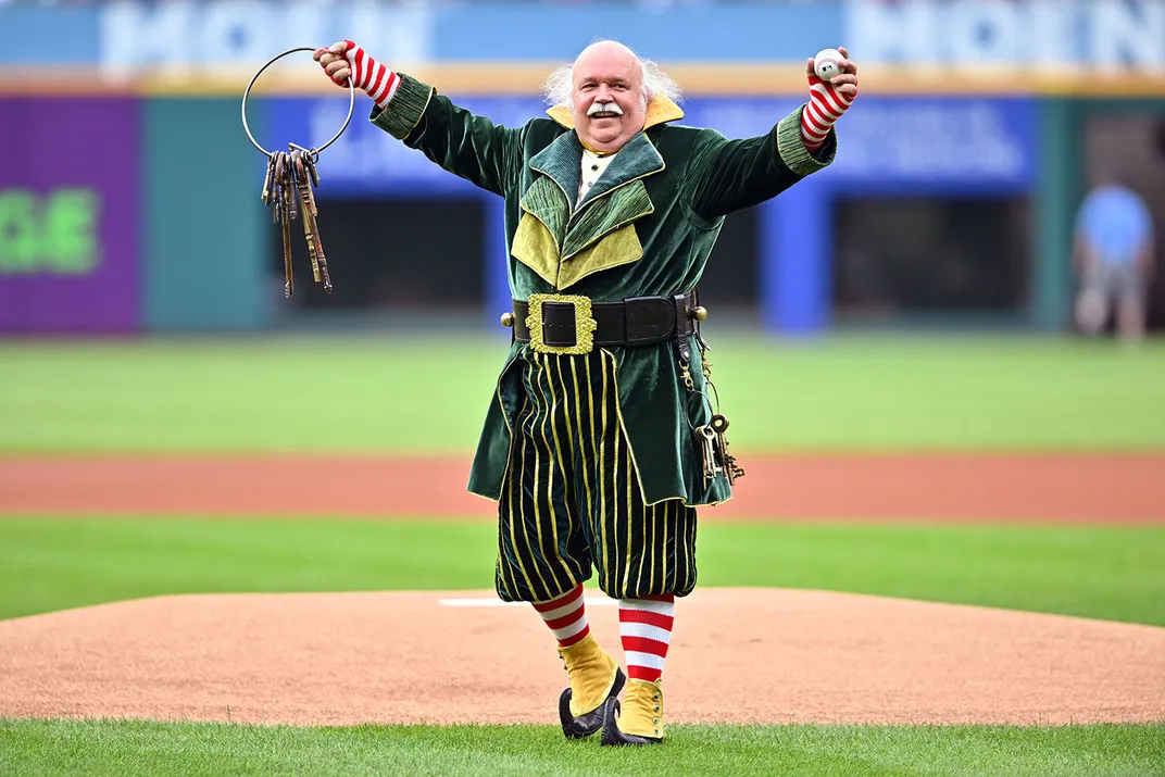 Don Beck, dressed up as Mr. Jingeling, greets the crowd prior to a July 2022 baseball game between the Cleveland Guardians and the Detroit Tigers.