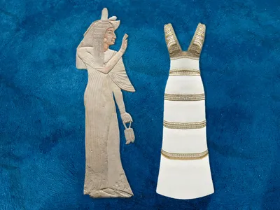 In an exhibition on ancient Egyptian-inspired fashion at the Cleveland Museum of Art, a relief depicts the wife of Amenhotep wearing a&nbsp;kalasiris, or long linen dress, juxtaposed with a white jersey gown designed by Karl Lagerfeld in 2019.