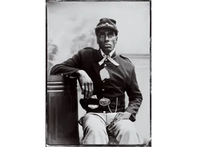 Jared Miller poses as his ancestor Richard Oliver, a soldier in the 20th Colored Infantry, at Penumbra Tintype Portrait Studio in New York City.