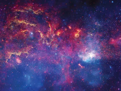 A new musical piece is based on this composite image of the center of the Milky Way. The bright spot on the right is hot gas in infrared light, marking the approximate location of the galaxy&#39;s supermassive black hole.