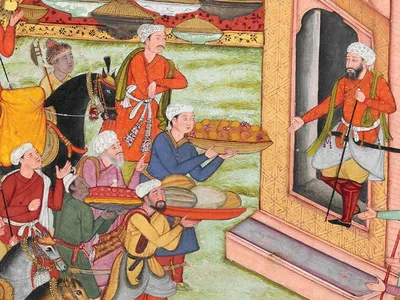 This plate, depicting a banquet being prepared for Babur and his relatives, is one of 143 miniatures in a 1590 illustrated version of The Babur-nama.